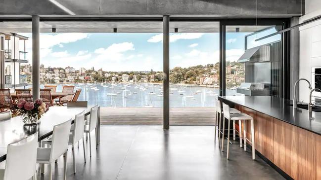 Dramatic modern interior with a prime view of Sydney. Picture: Airbnb