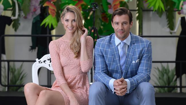 Kris Smith (right), with fellow Myer ambassador Nikki Phillips, sports a dashing powder blue spring racing look. Photo: Naomi Jellicoe.