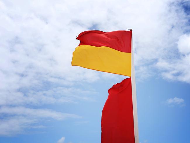 General, generic photos of Surf Lifesavers on Burleigh Heads beach. Life saving Australia red and yellow swimming flags. Picture: Brendan Radke.