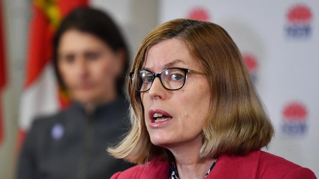 NSW Chief Medical Officer Dr Kerry Chant speaks to the media as Premier Gladys Berejiklian (left) watches from the background. Picture: AAP