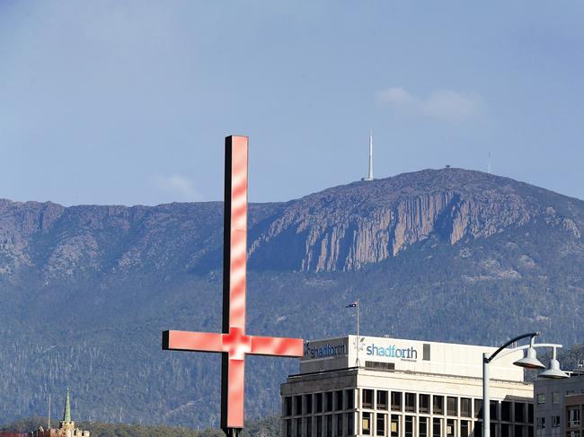 One of Dark Mofo’s inverted crosses on the Hobart Waterfront. Picture: RICHARD JUPE