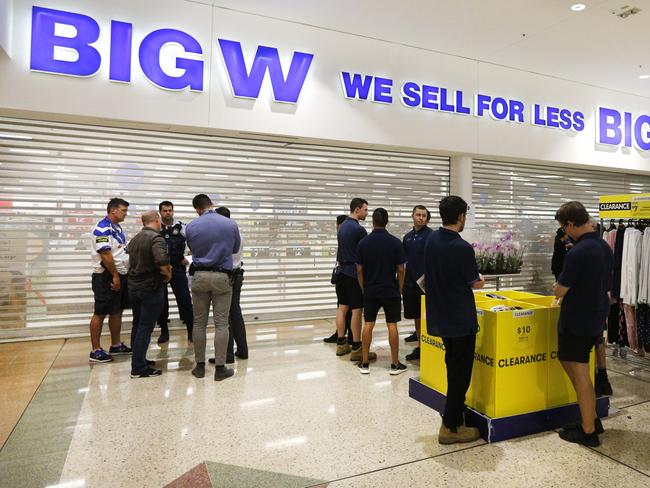 NSW and QLD Police closed off the front of Big W at Tweed City as staff stood around. Photo: Scott Powick Daily News