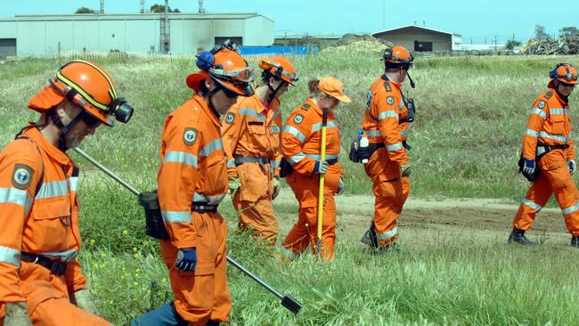 SES members search the Gillman area for remains of Steve Williams.