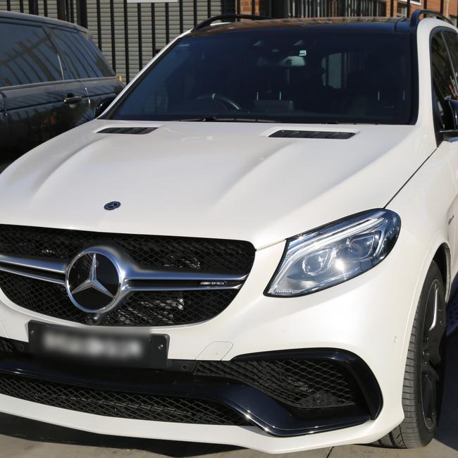 Detectives seized two luxury vehicles. Picture: Supplied