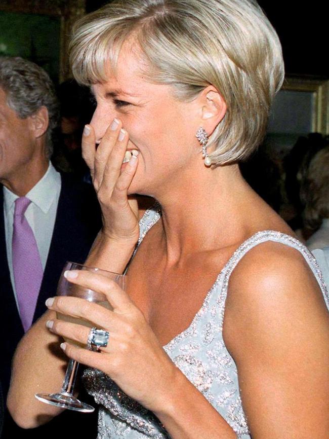 Princess Diana wearing the aquamarine ring Prince Harry has given to Meghan.