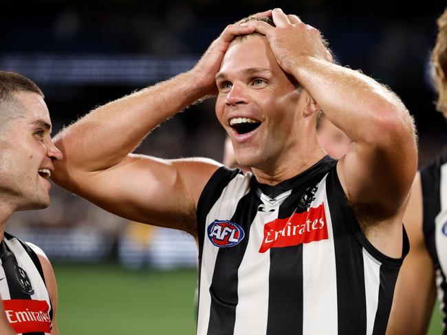 MELBOURNE, AUSTRALIA - MARCH 15: Dan Houston of the Magpies celebrates after a win during the 2025 AFL Round 01 match between the Collingwood Magpies and the Port Adelaide Power at the Melbourne Cricket Ground on March 15, 2025 in Melbourne, Australia. (Photo by Dylan Burns/AFL Photos via Getty Images)