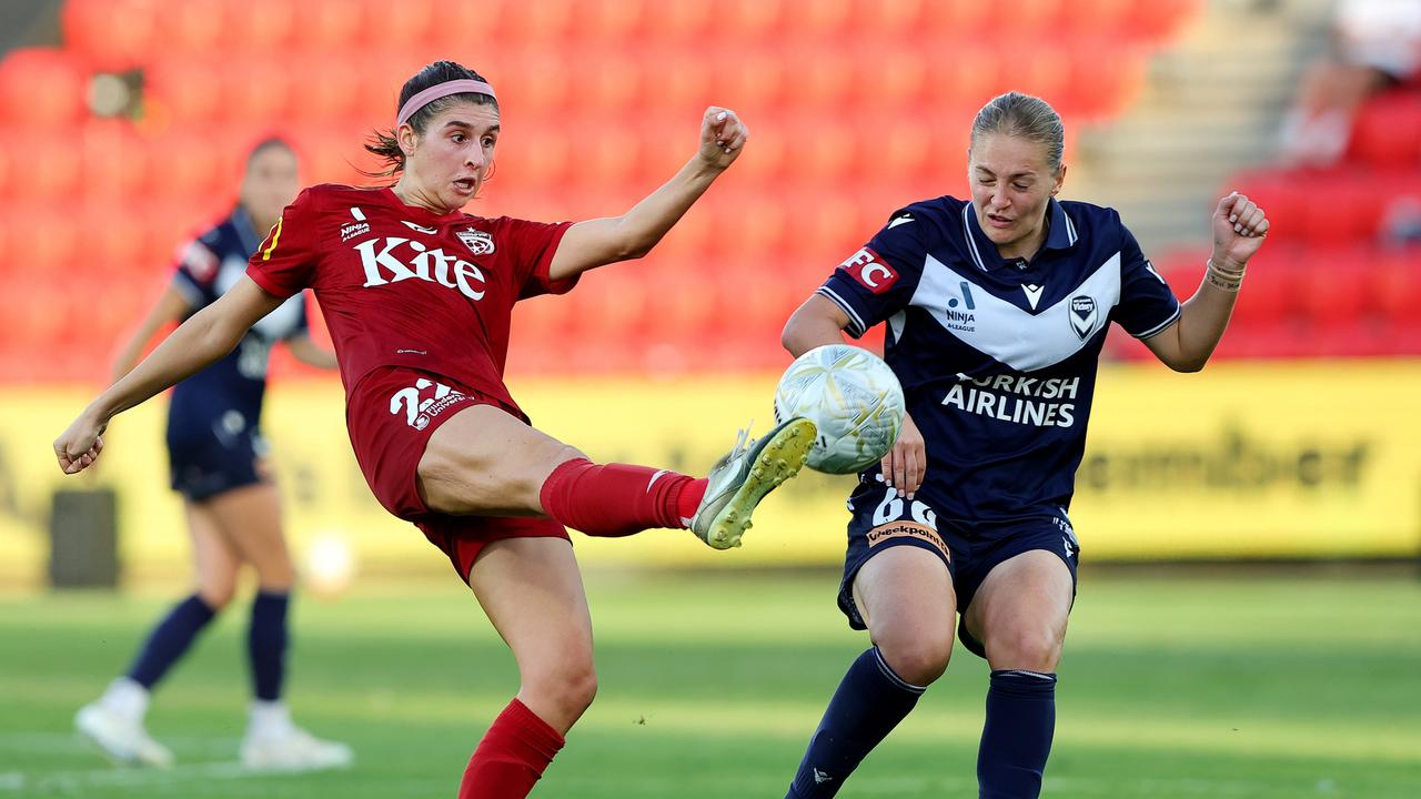 ADELAIDE, AUSTRALIA – MAY 04: Erin Healy of Adelaide United. and Alana Jancevski of Melbourne Victory during the First Leg of the A-League Women's Semi Final between Adelaide United and Melbourne Victory at Coopers Stadium, on May 04, 2025, in Adelaide, Australia. (Photo by Sarah Reed/Getty Images)