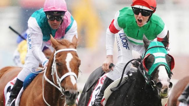 Lane roars his approval as Japan's Mer De Glace come from the clouds to claim the $5 million Caulfield Cup.