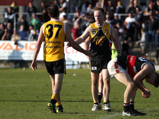 That’s it: Craig Nankervis (left) at the end of last season’s winning grand final.