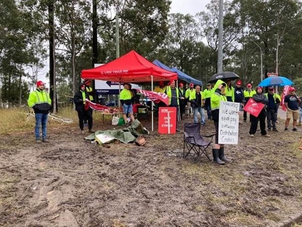 Woolworths Distribution Centre staff picketing outside the Warnervale facility as pay negotiations continue to break down. Picture: supplied