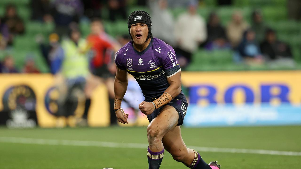 MELBOURNE, AUSTRALIA - JULY 20: Sualauvi Faalogo of the Storm celebrates scoring a try during the round 20 NRL match between Melbourne Storm and Sydney Roosters at AAMI Park, on July 20, 2024, in Melbourne, Australia. (Photo by Kelly Defina/Getty Images)