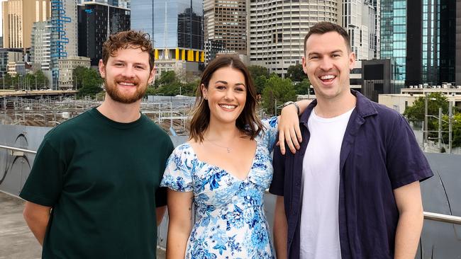 The new breakfast team of Ben Harvey, Belle Jackson and Liam Stapleton get acquainted with Melbourne. Picture: Ian Currie