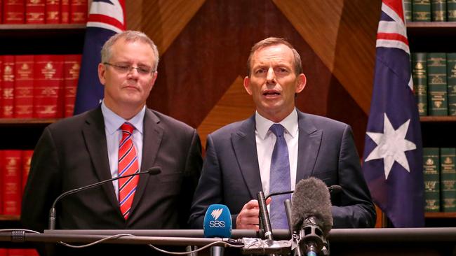 Tony Abbott and Scott Morrison address the media during a joint press conference in Melbourne in 2013.