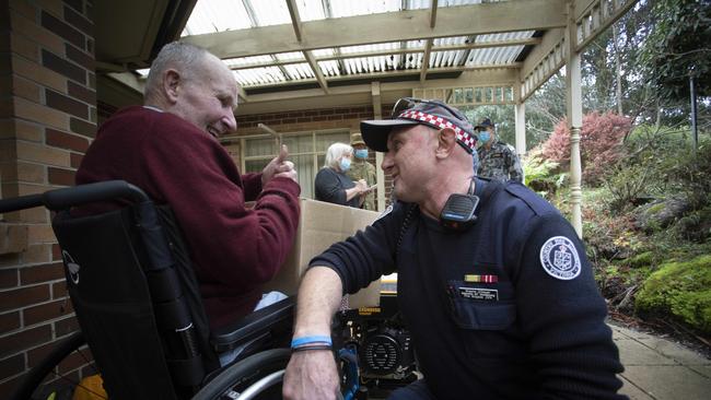 Volunteer firefighter Shane O’Dwyer delivers generators to Kalorama residents without power. Picture: Arsineh Houspian