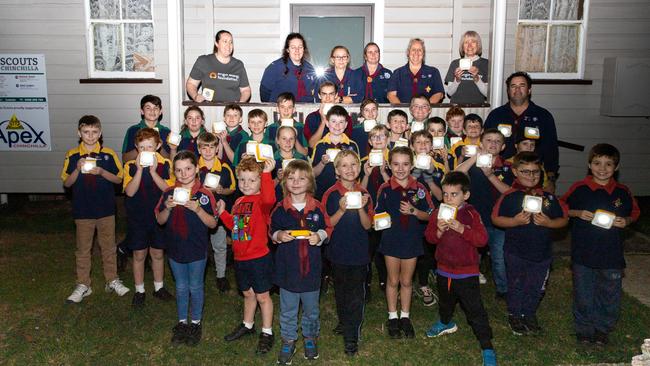 Chinchilla scouts have helped light the way for children living in poverty overseas, teaming up with Origin Energy to build solar powered lights. Photo/Origin Energy