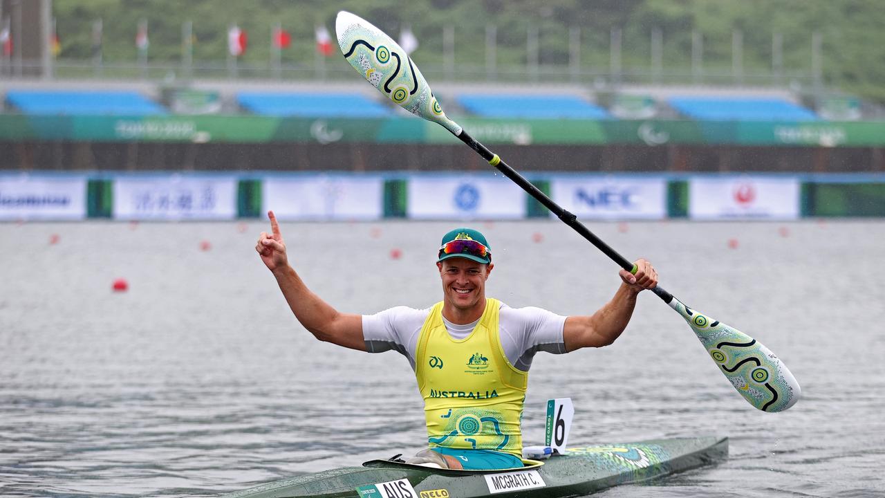 Curtis McGrath paused his celebrations to plead for financial support for Australian Paralympic athletes. Picture: Dean Mouhtaropoulos/Getty Images