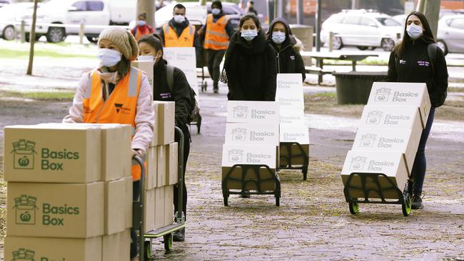 Food is delivered to the Flemington towers on Monday. Picture: Getty Images