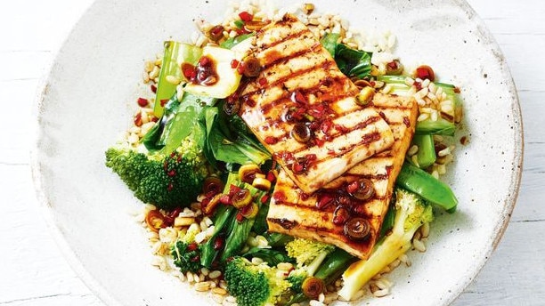 Tofu with brown rice and greens is an easy, healthy dinner option.