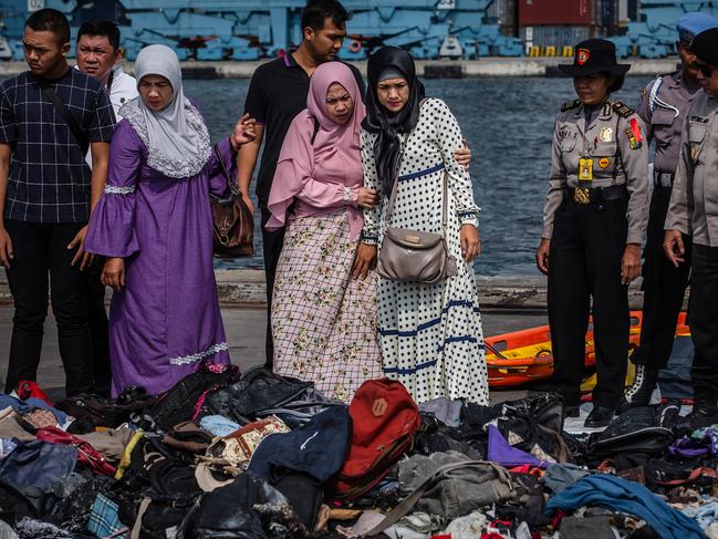 ***BESTPIX*** JAKARTA, INDONESIA - OCTOBER 31: Families of the victims of Lion Air flight JT 610, visit an operations centre to look for personal items of their relatives, at the Tanjung Priok port on October 31, 2018 in Jakarta, Indonesia. Rescuers have recovered bodies, body parts, and personal items in the wreckage, with all 189 passengers and crew feared dead. Lion Air Flight JT 610, travelling from Jakarta to Pangkal Pinang crashed in the Java sea on Monday morning shortly after takeoff. (Photo by Ulet Ifansasti/Getty Images)