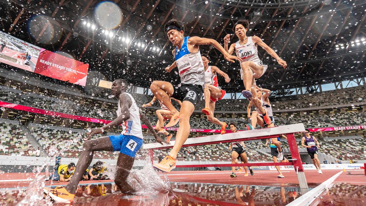 An athletics test event revealed the reality of hosting an Olympics during the pandemic. (Photo by Charly TRIBALLEAU / AFP)