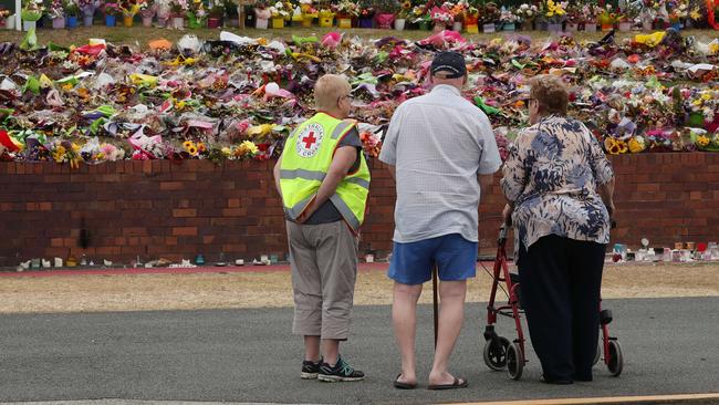 Members of the general public arrive to pay their respects. Picture by Scott Fletcher