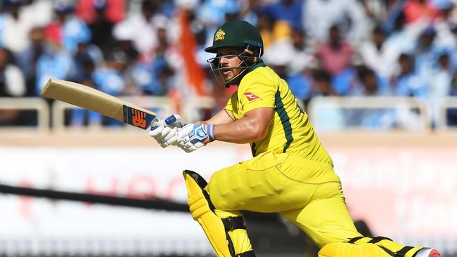 Australian cricketer Aaron Finch plays a shot during the third one-day international (ODI) cricket match between India and Australia at the Jharkhand State Cricket Association International Cricket Stadium, in Ranchi on March 8, 2019. (Photo by DIBYANGSHU SARKAR / AFP)