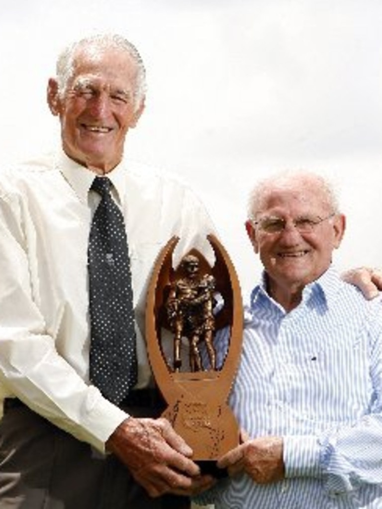 Norm Provan and Arthur Summons hold the trophy named in their honour.