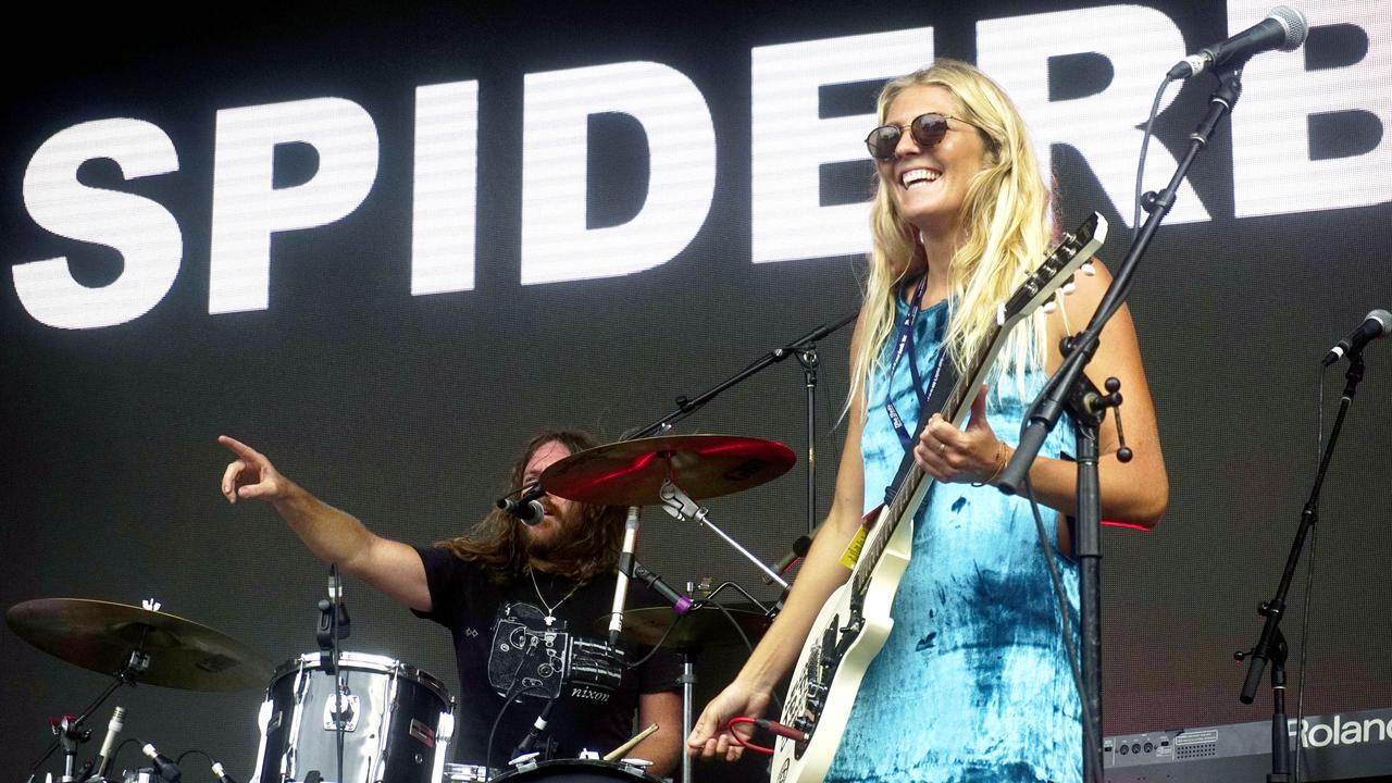 Eight-time world surfing champion Stephanie Gilmore performs with Spiderbait at the Falls festival at Byron Bay. She will rejoin them on stage at the Gold Coast Pro at Burleigh. Picture Luke Sorensen, Liquify Magazine