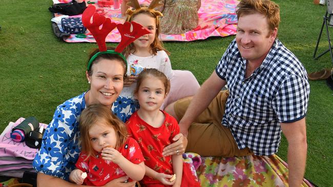 Carols by Candlelight at Riverway 2022. Sonia and Terry Foster with Zoe, 2, Hannah, 6, and Zoe, 2. Picture: Evan Morgan