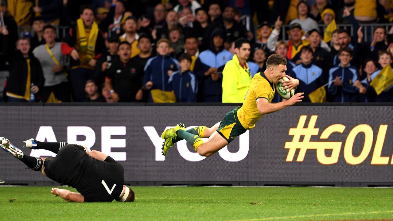 Nic White of the Wallabies scores a try during the Bledisloe Cup match.