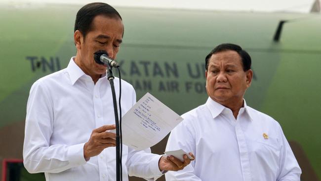 Indonesia's President Joko Widodo delivers a speech earlier this month as Defence Minister Prabowo Subianto looks on. Picture: AFP