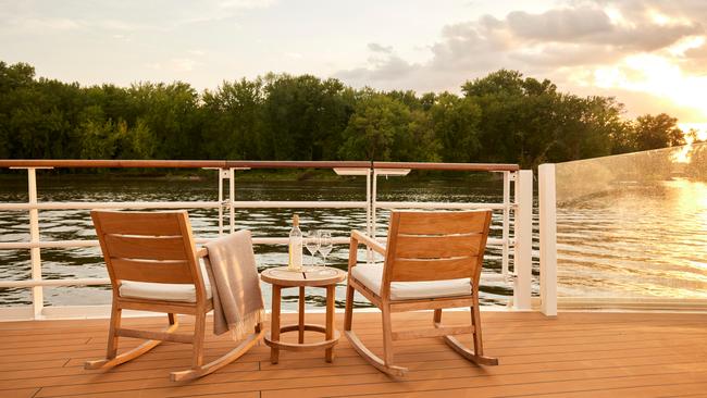 Relax in rocking chairs on the bow of the Viking Mississippi.