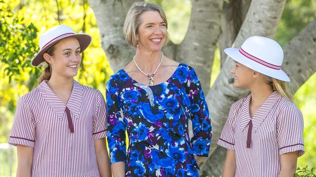 St John Fisher College principal Cathy Galvin (centre) with students.