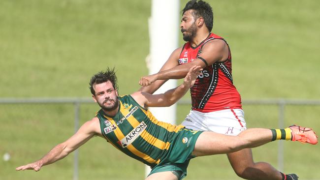 Shannon Rioli of the Tiwi Bombers tackles PINT’s Ashley Mullane in Round 11 of the 2022-23 NTFL season. Picture: Glenn Campbell