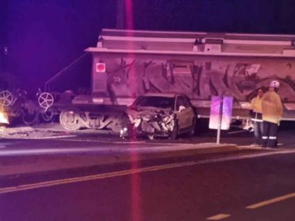 Bystander captures horrific crash between train and car which left two hospitalised (Photo: Drewe-Lochie McConville)