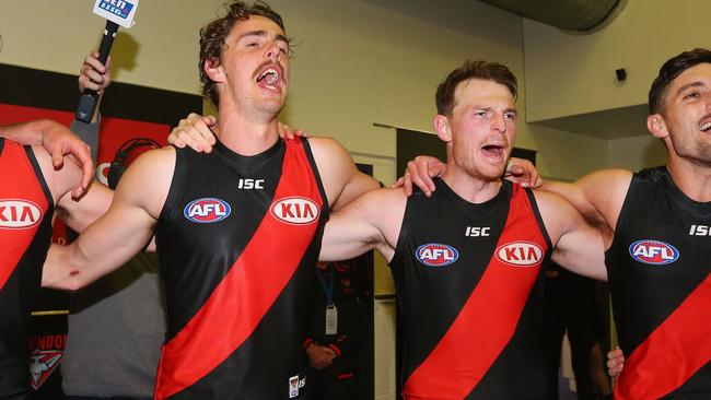 Joe Daniher and Brendon Goddard sing the Essendon song after a win. Picture: Getty Images