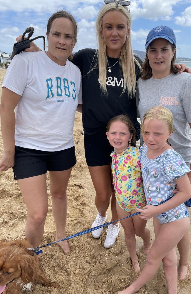 Safety Beach locals Katelyn Jowers, Gena Abbott and Sophie Jowers with Shiloh, 5, and Evie, 7, say people using cabanas to reserve a spot on the beach for hours are “elitist”. Picture: Lucy Callander.