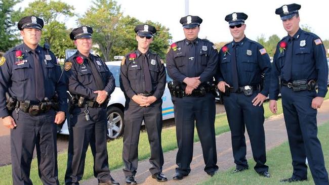 Six police officers took their fallen colleague’s daughter to her school Father-Daughter dance. Photo: Memphis Police Department.