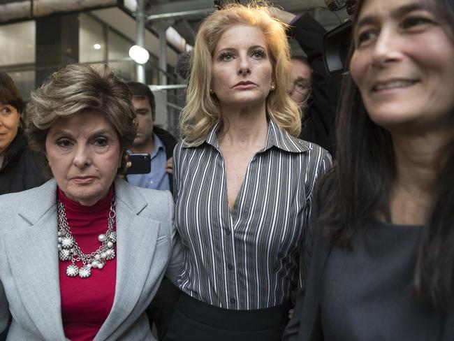 Ms Zervos leaves Manhattan State Supreme court with her legal team Gloria Allred, left, and Mariann Wang. Picture: Mary Altaffer