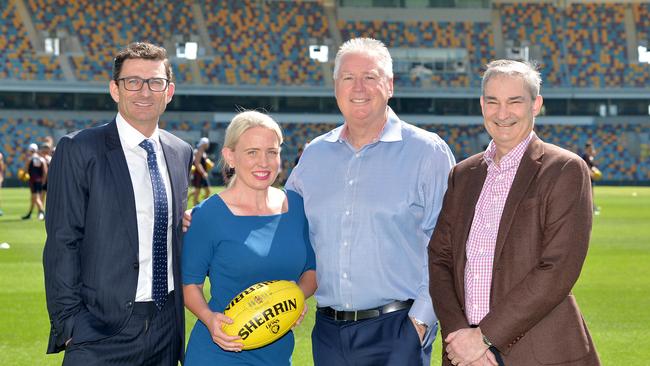 Tourism Industry Development Minister Kate Jones, Brisbane Lions Chief Executive Officer Greg Swann and AFL General Manager of Clubs and Broadcasting Travis Auld (L) officially announced the three-year Easter Thursday deal on Friday morning. Picture: Bradley Kanaris/Getty Images