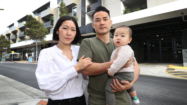 Jason and Esther Ng and their 8-month-old baby, Hayden at their rental in Doncaster East. They have just purchased a house and have to make necessary adjustments to accommodate for cost of living pressures, especially with a newborn baby. Picture: David Caird