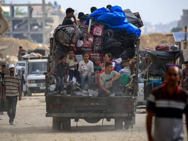 Displaced Palestinians flee after the Israeli army issued a new evacuation order for parts of the southern Gaza Strip on July 2. Picture: AFP
