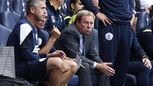 Queens Park Rangers' Harry Redknapp, center, watches on at his old ground.