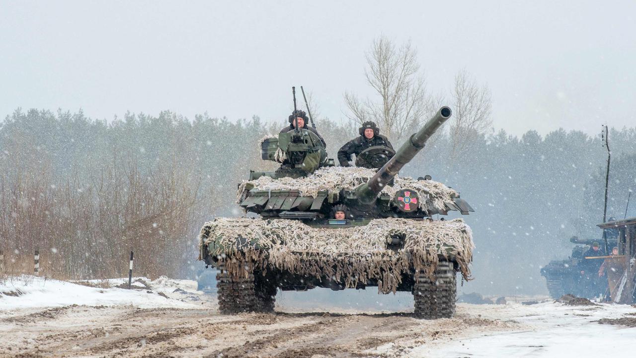 Ukrainian Military Forces servicemen of the 92nd mechanised brigade use tanks, self-propelled guns and other armoured vehicles to conduct live-fire exercises near the town of Chuguev. Picture: Sergey BOBOK/AFP