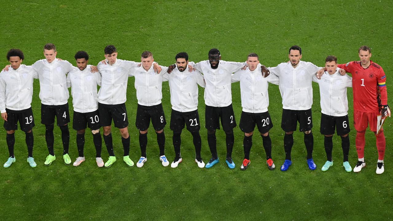 Germany line up for the national anthem