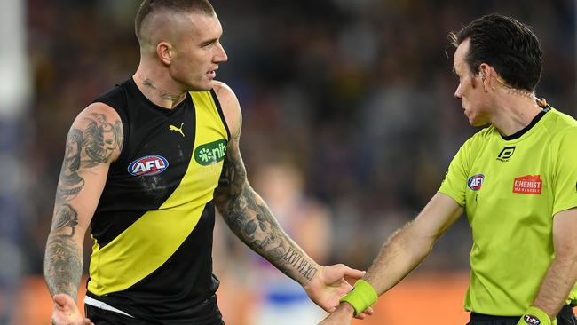 MELBOURNE, AUSTRALIA - APRIL 08: Dustin Martin of the Tigers speaks to the umpire during the round four AFL match between Richmond Tigers and Western Bulldogs at Melbourne Cricket Ground, on April 08, 2023, in Melbourne, Australia. (Photo by Quinn Rooney/Getty Images)