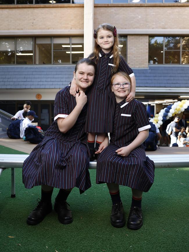 The Dolan-Gold sisters at Year 7 orientation at St Mary's Cathedral College on Tuesday. Picture: Richard Dobson