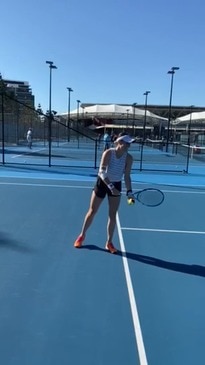 Kimberly Birrell serving a ball during her rehab.