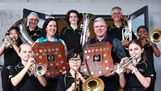 Cairns Brass has sent three of its bands to state competitions in recent weeks, coming back with three first place results. The Cairns Brass B grade band won the New South Wales state competition, before both the C grade and junior band competed in the Queensland competition on won. (back row) Gary George, Jacob Ahern, Greg Martin, (middle row) Lara Oya, junior band conductor Julia Christo, musical director Jon Christo, Jaine Chandra, (front row) Carmel Hall, Lyle Oya and Rebecca Cochi are pleased with the results from the recent state competitions. Picture: Brendan Radke