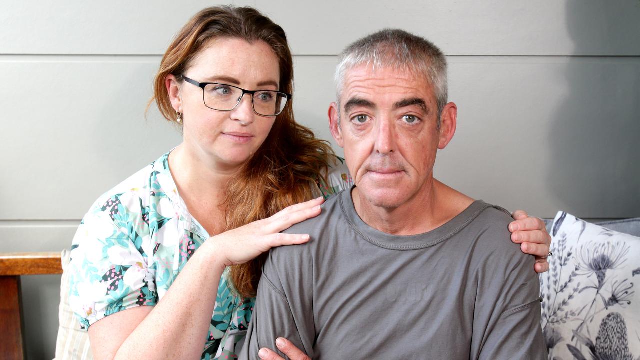 Justin Schooneman, pictured with partner Julia Walker, spent the night neck-deep in water after his Sunshine Coast hinterland home flooded. Picture: Steve Pohlner